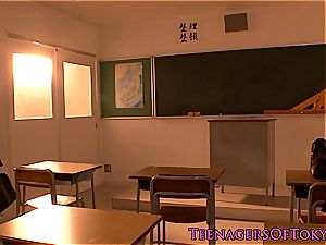 asian lesbian students kiss and caress after class
